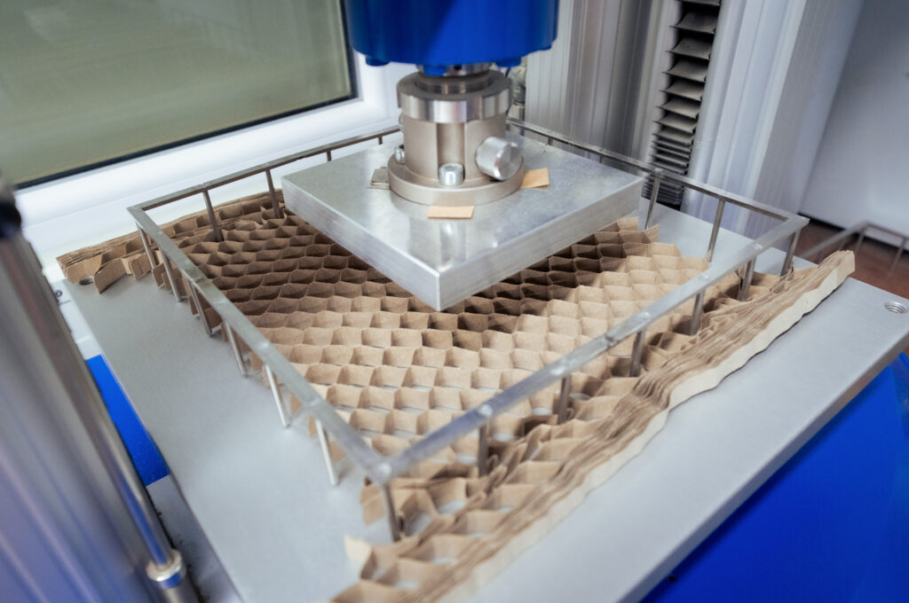 Paper honeycomb core compressive strength test.